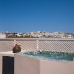 Suite 203 balcony suite with outdoor hot tub at The Cosmopolitan Karterados Urban Suites